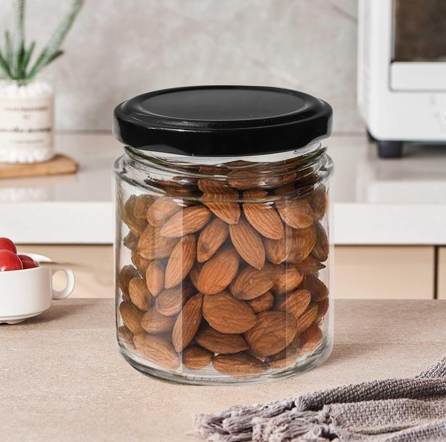 Pure Source India 50 g Crystal Clear Round Glass Jar with Black Cap, Set of 6 | Airtight Food-Grade Storage Container | Rust-Free Jar for Spices, Dry Fruits, Sugar, Tea, Coffee & Kitchen Storage